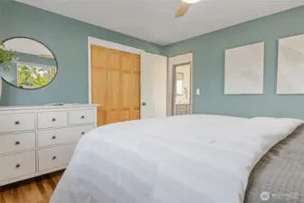 Primary bedroom has large closet adjacent to full hall bathroom.