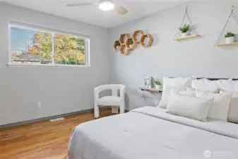 Second bedroom with hardwood floors.