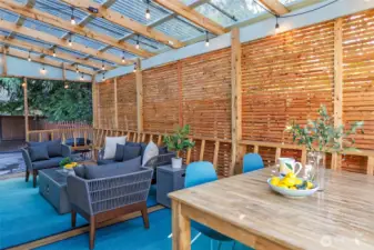 Clear covered deck allows for light-filled use anytime of year.