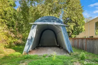 Property Extends Beyond the Fence through the Graded Area, including the Canopy Area (Canopy is Removable)