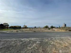 Gravel road to property.  Located on a dead end street.