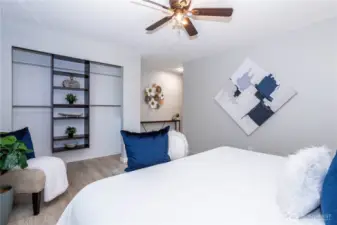 The closet storage wall is easily accessible, and the open floor space allows for multiple furniture layouts. Natural light keeps the room from feeling enclosed, while neutral finishes make it adaptable to any use. It’s a flexible space ready to evolve with changing needs — from sleeping quarters to workspace.