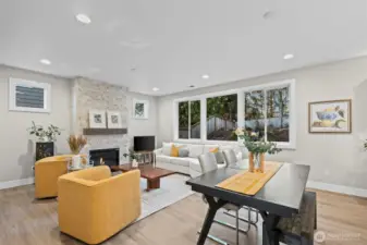 After dinner, relax and retire to the living room with lovely tile surround gas fireplace.