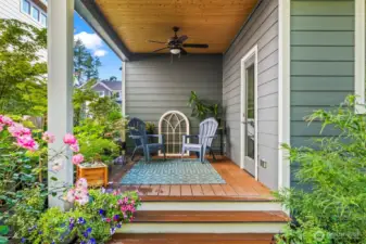 A gardener's paradise, a lovely sanctuary... hard to remember you're in the city!  This covered deck with light and ceiling fan is great in all seasons.