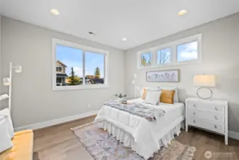 The main floor bedroom and full bath make this home a perfect 10 for versatility.  Use it as an office or den until/unless you need it to be a bedroom.  It's bright, cheery and spacious.