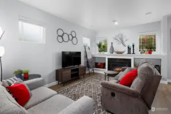 Fantastic living room with gas fireplace and many windows for light and bright space!