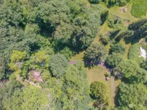 aeria view of home on left and long driveway up to the house.