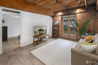 Another view of the main living area and bedroom entry.