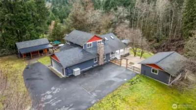 Located moments from Gig Harbor and Hwy 16. This 3 bed, 2.5 bath home with multiple outbuildings is the perfect place to live and escape!