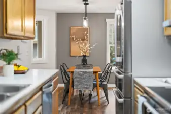 Stainless steele appliances and oak cabinets throughout the kitchen.