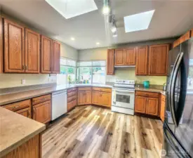 Awesome kitchen in the 2nd home.  So many cabinets and excellent counter space.