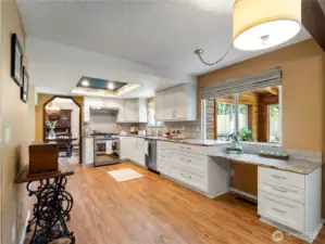 Room for it all: home office, kitchen table, or add a kitchen island for additional workspace.