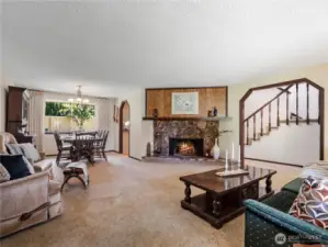 The large living room has so much space. The woodburning fireplace gives nice ambiance on those cold winters days.