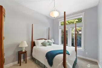 Airy bedroom with lots of space.