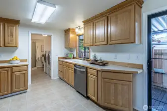 You'll appreciate all the storage & work areas in this kitchen.