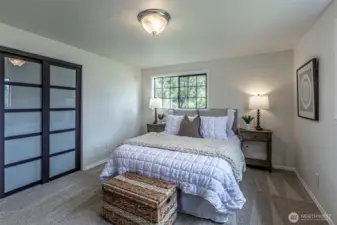 Second view of the primary bedroom.