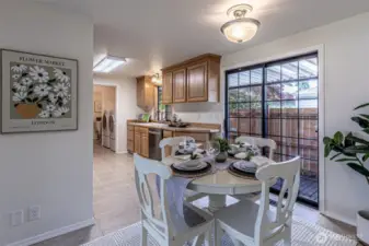 Kitchen & dining area with ceramic tile flooring.
