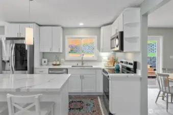 New stainless steel appliances, quartz countertops, huge island. Breakfast nook.