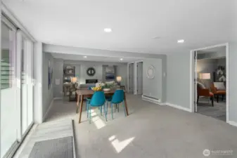 Second dining room in ADU or MIL unit. Spacious with new carpeting, new millwork and new paint.
