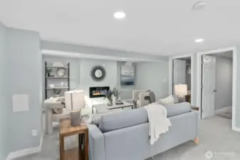 Second living room in ADU or MIL unit. Spacious with new carpeting, new fireplace, new millwork and new paint.