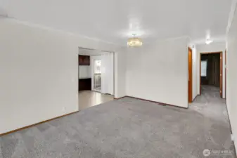 Formal dining area opens to living room to have your dining table open with all the leaves at holidays!