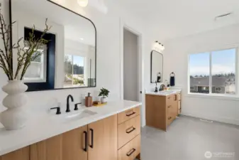 Primary bathroom is spacious and functional!