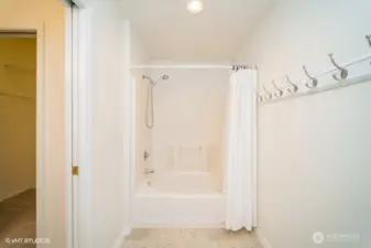The primary bath boasts a soaking tub, perfect for relaxing after a long day.