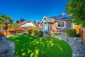 Another view of the lovely front yard. The house also has permanent outdoor lighting and you can change the colors for the season or event (hint, Go Seahawks!).  Come on in and take a look inside!
