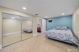 One of the downstairs bedrooms, with a large closet.