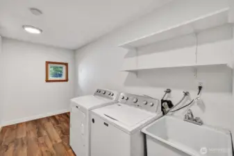 Laundry room with wash basin.