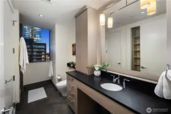 Second ¾ bath with ultra quiet Meile Washer/Dryer tucked away behind a solid door