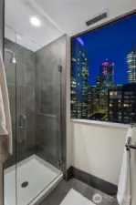 Enjoy stunning city and bay views while washing away the day’s stresses