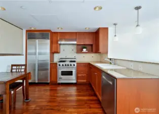 Kitchen has high end srainless steel appliances and granite counter tops