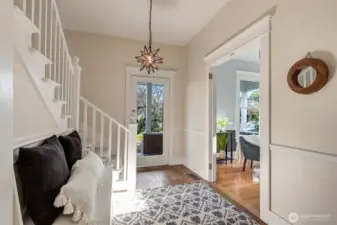 Entry to living room has beautiful leaded glass french doors. They are currently removed, but could easily be put back on.