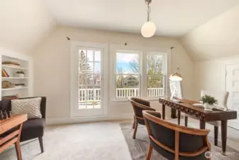 This bedroom also makes a great office or game room. Peek-a-boo views of Lake Washington in the winter. Door leads to deck.