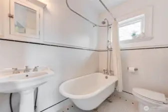 Full bath with heated tile floors.