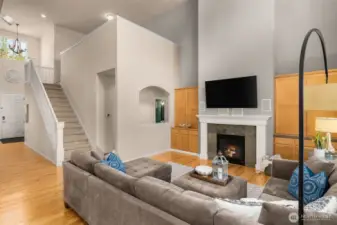 An open concept great room is made even more grand with vaulted ceilings.