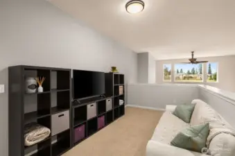 Upstairs is a generous loft area with views to the southwest.