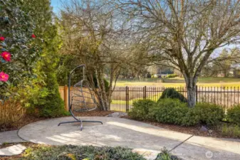 The yard is fully fenced, and this gate opens to the mountain view walking path. The disc golf course is just beyond the path.