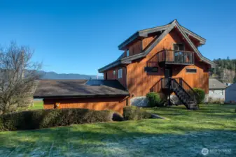 Back elevation of home and garage