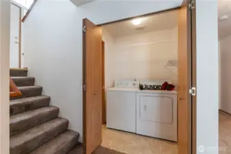 Laundry room with a storage room off to the left. Gotta seee it.