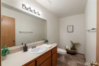 Half bath downstairs. Room for a tub and shower combo.