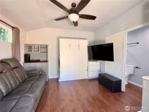 Murphy bed is shown put up.