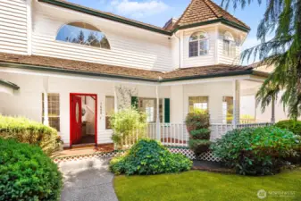 Welcome home! A wrap around, covered porch you will swoon over - and a turret in the front and in the back of the home.