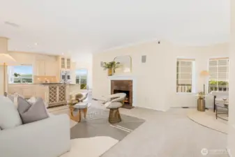 Living room off kitchen with gas fireplace. New carpeting and paint. Built in speaker system as well.