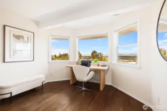 Office on the second floor with oak hardwood floors and views.