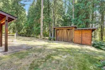 Extremely handy 455 sq. ft. lean-to shed with 2 compartments & located near the barn.