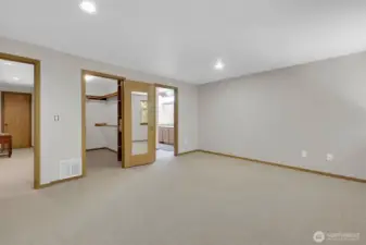 Primary bedroom with walk-in closet and ensuite.