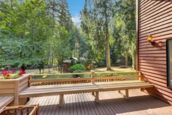The expansive rear deck is with built-in benches & flower boxes.