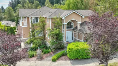 Discover this exquisite multi-level home, perfectly situated on a corner lot in a desirable Auburn neighborhood. The inviting layout features bright, open living spaces filled w/natural light, creating a warm & welcoming atmosphere. A thoughtfully designed kitchen offers ample cabinetry, modern finishes & a seamless flow to the living rm—ideal for entertaining. Upstairs boasts a spacious primary w/en suite, plus 3 guest rooms. Enjoy a main floor office/flex space, and a lower level featuring a large bonus room, guest bath, storage/kitchenette space with wine rack. Endless opportunities w/this spacious layout! Conveniently located near parks, schools, shopping, & major commuter routes, this home combines comfort w/unbeatable accessibility.